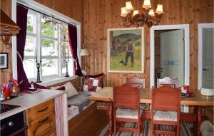 Et sittehjørne på 3 Bedroom Gorgeous Home In Passebekk