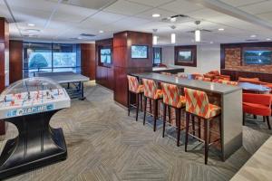 a room with a bar and a pool table at Clarendon 1BR w Gym WD Doorman nr Metro WDC-350 in Arlington +33 photos