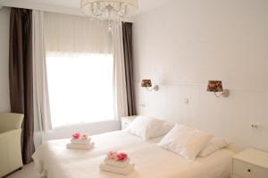 Voodi või voodid majutusasutuse Hotel 't Witte Huys Scheveningen toas