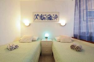 Posteľ alebo postele v izbe v ubytovaní Ocean Front Apartment + 16 fotografií