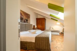 a bedroom with two beds in a room at Affittacamere Valentina in Orvieto