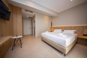 Postel nebo postele na pokoji v ubytování Hotel Portanova