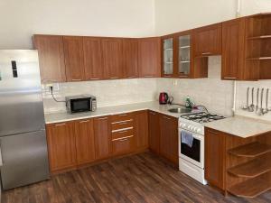 Kuchyňa alebo kuchynka v ubytovaní Apartmány u Arény Ostrava