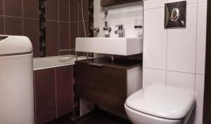 Kúpeľňa v ubytovaní Doba In Ua Peremoga Apartments