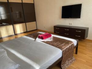 Posteľ alebo postele v izbe v ubytovaní Doba In Ua Peremoga Apartments