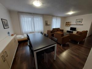 TV a/nebo společenská místnost v ubytování Levidom Residence Rooms