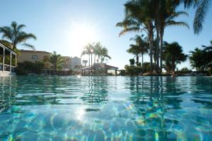Der Swimmingpool an oder in der Nähe von Hotel Porto Mare - PortoBay