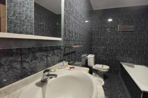 Koupelna v ubytování Apartamento Vacacional Camiño a Quenxe