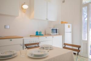 Kuchyň nebo kuchyňský kout v ubytování Appartamento La Triglia 2 - HelloElba