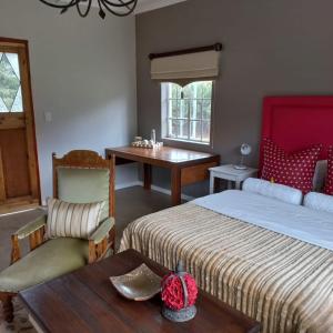 Ένα ή περισσότερα κρεβάτια σε δωμάτιο στο Rocks & Roses Farm stay