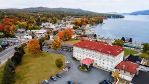 an aerial view of a town next to a body of water at Fort William Henry Hotel in Lake George