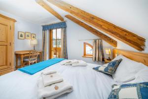 A bed or beds in a room at Casa il Tiglio