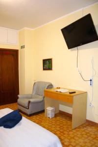 TV a/nebo společenská místnost v ubytování Roma Tiberius Suite