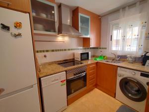 Kuchyň nebo kuchyňský kout v ubytování ACV - Neptuno-2ª linea planta 6 norte 2