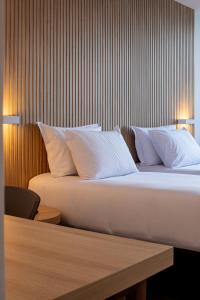 Postel nebo postele na pokoji v ubytování Sooz Hotel Collection