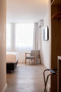 Postel nebo postele na pokoji v ubytování Sooz Hotel Collection