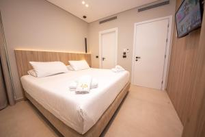 Postel nebo postele na pokoji v ubytování Hotel Portanova