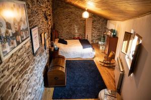a bedroom with a bed and a couch in a room at Casa da Ferreira_Vila Real in Vila Real +38 photos