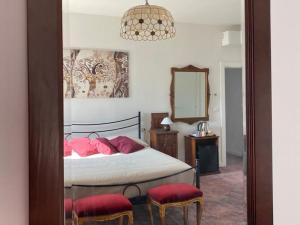 A bed or beds in a room at Sacripante