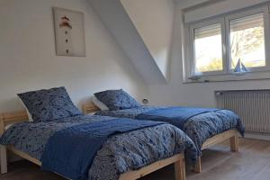 Posteľ alebo postele v izbe v ubytovaní Entre Nausicaa et Wimereux