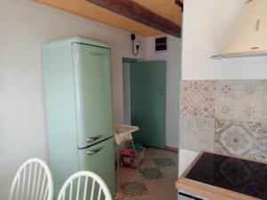 Kuchyň nebo kuchyňský kout v ubytování Idill Cottage Vendégház