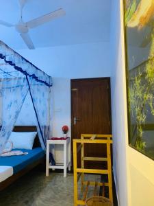 Ένα ή περισσότερα κρεβάτια σε δωμάτιο στο White Heaven Villa