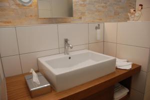 Koupelna v ubytování Hotel Speicher + 28 fotografií