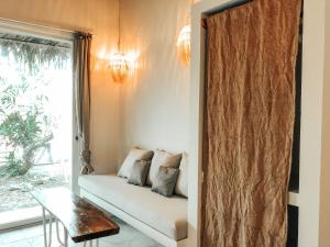 Postel nebo postele na pokoji v ubytování Ayampe Lofts + 11 fotografií