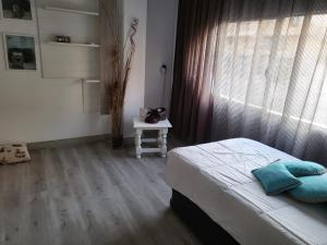 Posteľ alebo postele v izbe v ubytovaní Casa Violeta