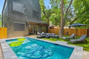 a house with a swimming pool in a yard at Modern Luxury Home - Minutes from Lady Bird Lake in Austin