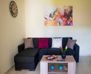 A seating area at Charming apartment in Halepa!