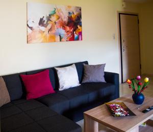 A seating area at Charming apartment in Halepa!