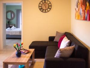 A seating area at Charming apartment in Halepa!