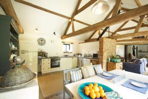 A kitchen or kitchenette at White Horse Farm Luxury Holiday Barns 