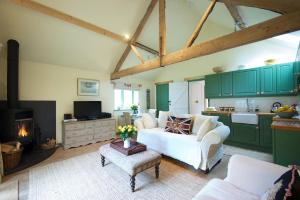 A seating area at White Horse Farm Luxury Holiday Barns 
