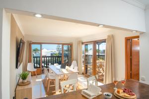A balcony or terrace at Villa Cavendish with sea views and heatable pool close to Flamingo Beach