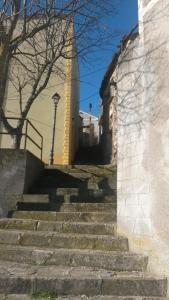 a set of stairs leading up to a building at B&B Il Belvedere Viggiano in Viggiano +1 photo