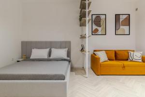 InshiApartments on Ferentsa Lista str tesisinde bir odada yatak veya yataklar