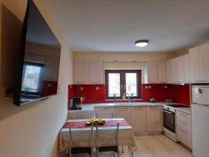 A kitchen or kitchenette at Charming apartment in Halepa! Még 19 kép