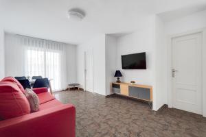 A television and/or entertainment centre at Apartament Sofia