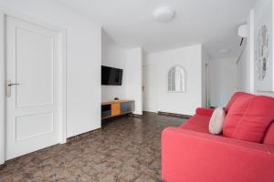 A television and/or entertainment centre at Apartament Sofia