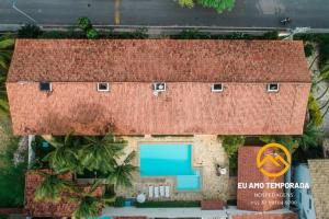 an overhead view of a house with a swimming pool at @euamotemporada Cumaru APT 207 - 100m da Praia in Marechal Deodoro
