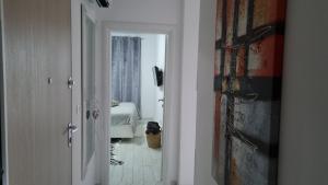 Łóżko lub łóżka w pokoju w obiekcie Apartman Magnolija Umag