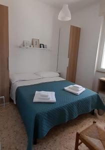 A bed or beds in a room at Villa Marisole