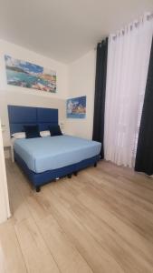 Postel nebo postele na pokoji v ubytování Affittacamere 5 Terre Dolci Sogni
