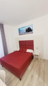Postel nebo postele na pokoji v ubytování Affittacamere 5 Terre Dolci Sogni