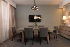 A television and/or entertainment centre at Airotel Stratos Vassilikos Hotel