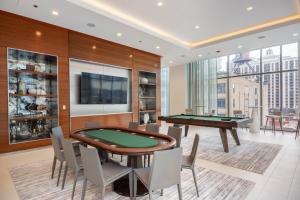 a dining room with a table and billards at S Loop 1BR w Pool Gym nr Michigan Avenue CHI-84 in Chicago