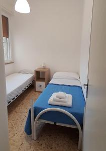 A bed or beds in a room at Villa Marisole