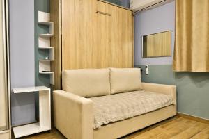 a chair in the corner of a room at Apollo 3 - Luxury Apartment (City Center Studio) in Katerini